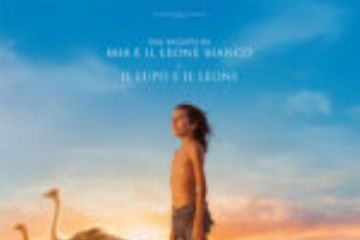 locandina film Il figlio del deserto ragazzino protagonista del film in piedi e sullo sfondo animali del deserto