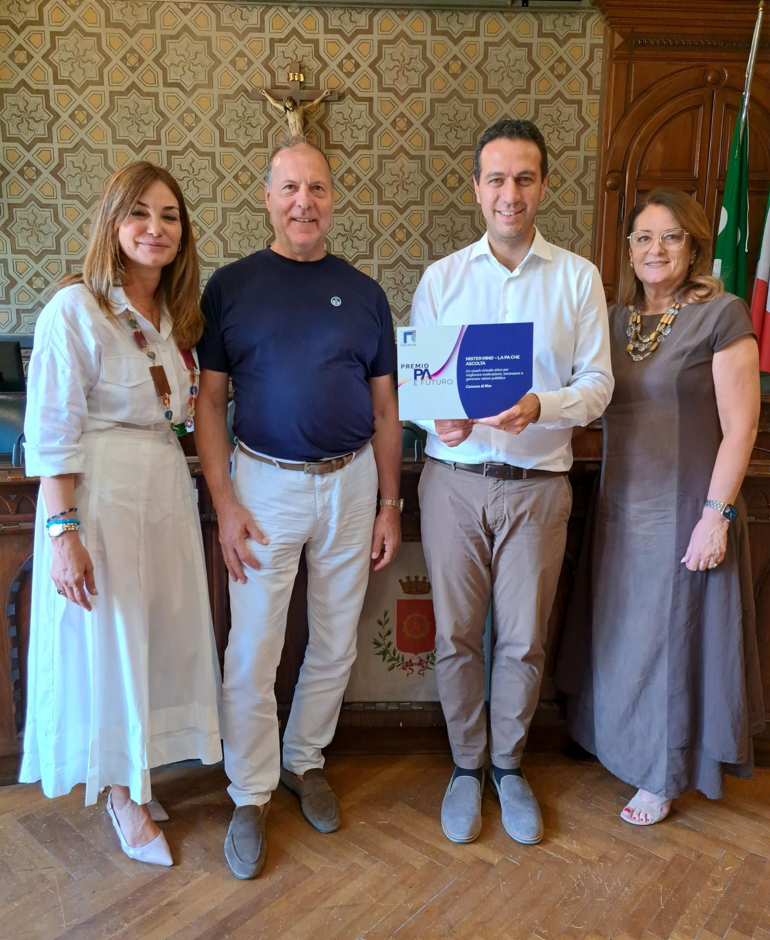 Raffaella Sella, ad di Alpha Network; il coach Steve Benedettini; il Sindaco Andrea Orlandi e la dirigente del Personale Emanuela Marcoccia, che ha ritirato il premio a Roma a FORUM PA
