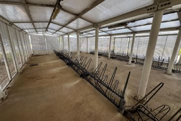 Nella foto la ciclostazione di piazza Costellazione appena rinnovata, in allegato il cantiere per il raccordo tra il plesso Franceschini e il parco Ghisolfa e una immagine delle innaffiature