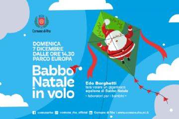 locandina babbo Natale in volo un aquilone con all'interno disegnato un babbo natale